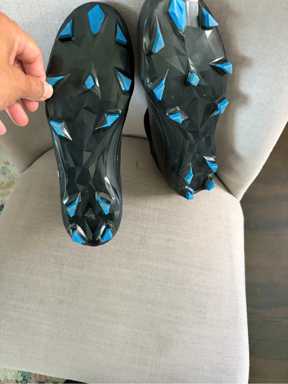 adidas Men’s Black Soccer Cleats with Blue and Red Trim